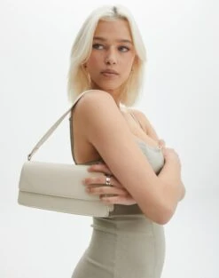 Shimmer Knit Halter Mini Dress 27 Shimmer Knit Halter Mini Dress -Everrastyle Shop casper classic shoulder bag vanilla bean front bg76168pu