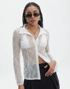 Pointelle Curve Hem Cropped Long Sleeve Top 31 Pointelle Curve Hem Cropped Long Sleeve Top -Everrastyle Shop tali lace fitted cardigan milk front tc131029lac